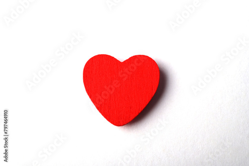 photo of red heart on white background, symbol of love