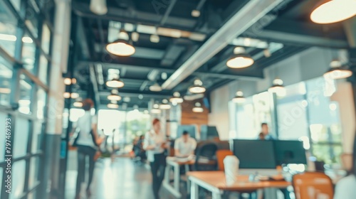 Blurred background of an open space office with business people working