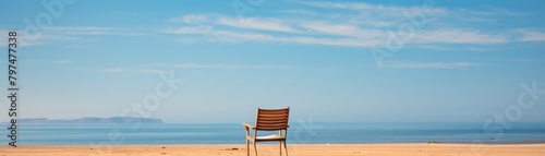 Lonely chair on the beach © sorrakrit