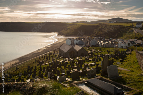 St. Hywyn's Church and the village of Aberdaron, Wales. Aberdaron is on the coast of the Llyn Peninsula in Gwynedd, North Wales. photo