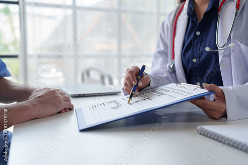 The doctor is examining the patients according to the checklist, annual visits to the doctor for physical examination. And follow the symptom check after taking medicine, health examination concept