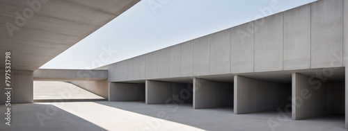 Architectural details of abstract concrete structures against a minimalist backdrop.