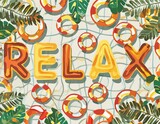 Relax word spelled out in inflatable pool floats in a summer holiday swimming pool.