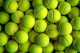 Lots of vibrant tennis balls, pattern of new tennis balls for background