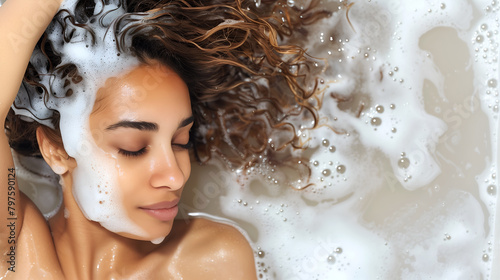 Fashion commercial advertisement. Radiant natural skin woman lying in foam bubbles soapsuds soap water for shampoo soap skincare ad. copy text space 