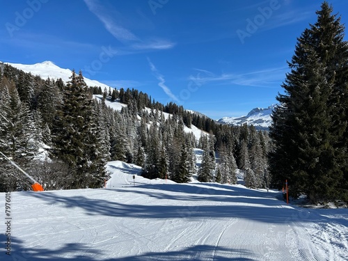 Amazing sport-recreational snowy winter tracks for skiing and snowboarding in the area of the tourist resorts of Valbella and Lenzerheide in the Swiss Alps - Canton of Grisons, Switzerland (Schweiz)