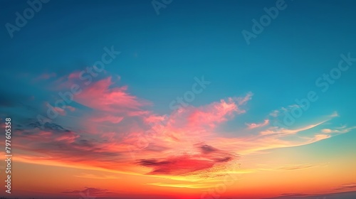 At sunset, the sky displays a beautiful gradient of orange to blue, creating a breathtaking and picturesque view.
