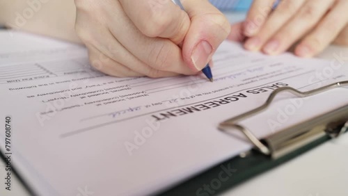 Wallpaper Mural Sales agreement, hand fills out a document, client signature,  purchase order, customer satisfaction Torontodigital.ca