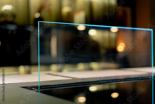 close-up of professional kitchen on a stove with a glass wall to retain fat when frying foods