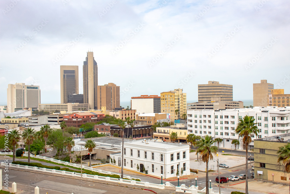 Corpus Christi, Texas - March 15, 2020: Downtown Corpus Christi skyline buildings along the Gulf Of Mexico. Taken in Corpus Christi Texas on a cloudy overcast day Corpus Christi, Texas - March 15, 2020: Downtown Corpus Christi skyline buildings along the Gulf Of Mexico. Taken in Corpus Christi Texas on a cloudy overcast day
