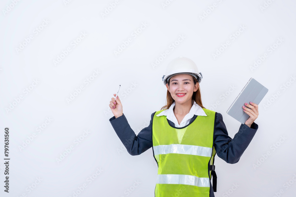 Happy woman engineer worker working with digital tablet on white background. Happy woman engineer worker working with digital tablet on white background.