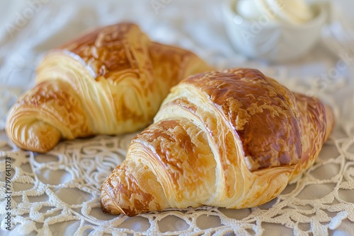Golden Bakery Delights: Two Delicious French Croissants in Soft Focus Breakfast Photography