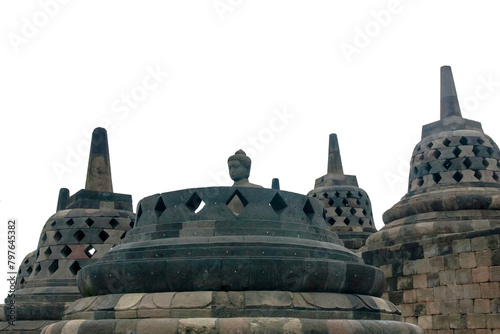 Borobudur Temple. The top terrace  with an open perforated stupa and a seated Buddha sculpture. Central Java, Indonesia. Transparent background.