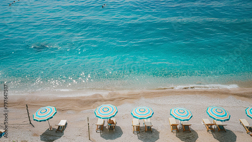 The beach with chairs and umbrellas