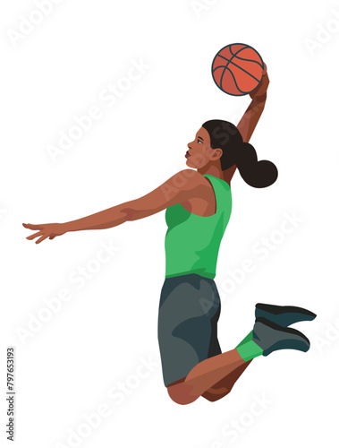 African women's basketball girl player in a green jersey in profile who jumps high to dunk the ball into the hoop