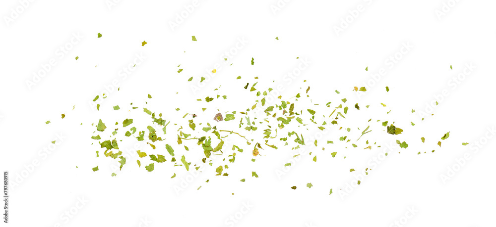 Chopped dry parsley leaves, pile isolated on white background, top view Chopped dry parsley leaves, pile isolated on white background, top view