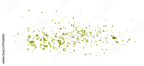 Cuadro en lienzo Chopped dry parsley leaves, pile isolated on white background, top view