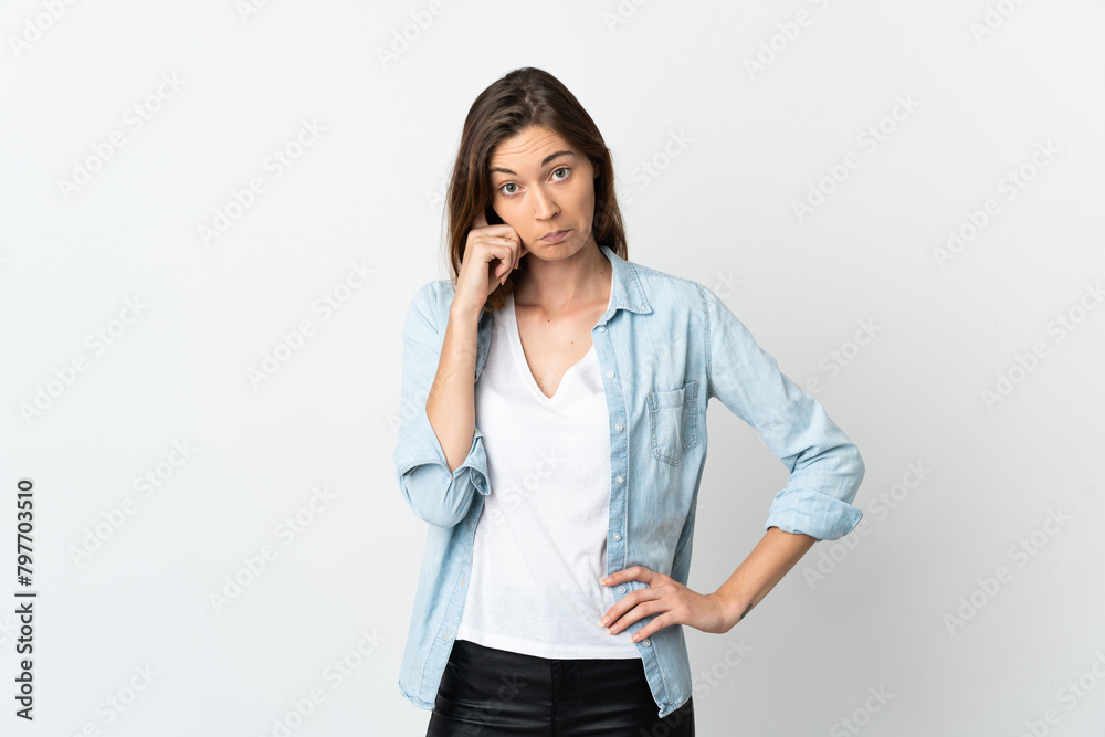 Young Ireland woman isolated on white background thinking an idea Young Ireland woman isolated on white background thinking an idea