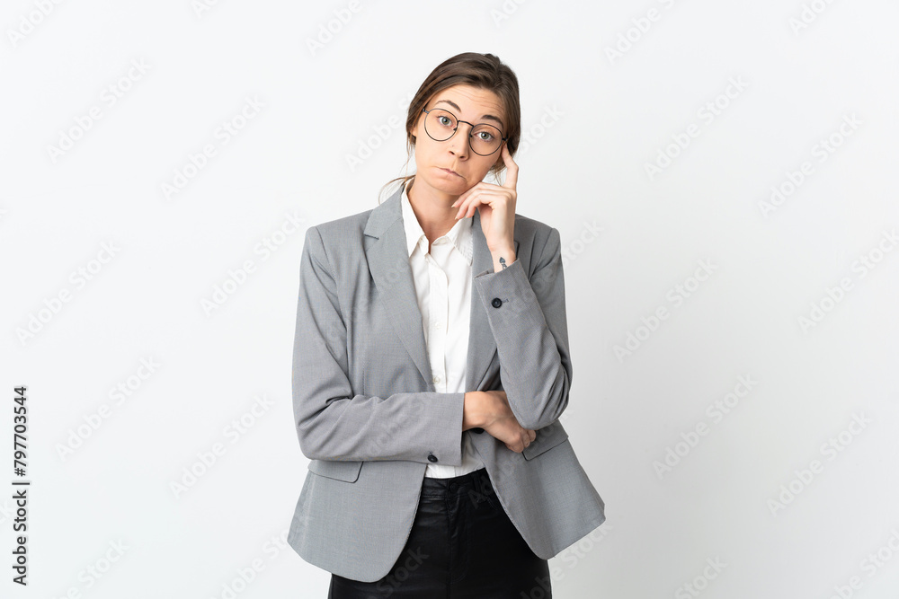 Business Ireland woman isolated on white background thinking an idea Business Ireland woman isolated on white background thinking an idea