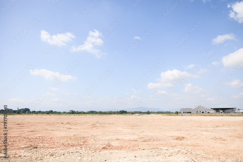 Obraz premium Land, blue sky and clouds. Include landscape, empty or vacant area at outdoor. Real estate or property for sale, rent, but, development, housing subdivision and construction in Chiang Mai of Thailand.