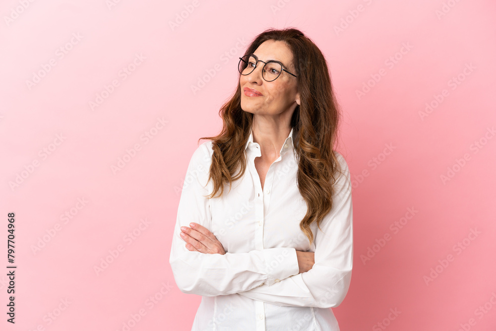 Middle aged caucasian woman isolated on pink background happy and smiling Middle aged caucasian woman isolated on pink background happy and smiling