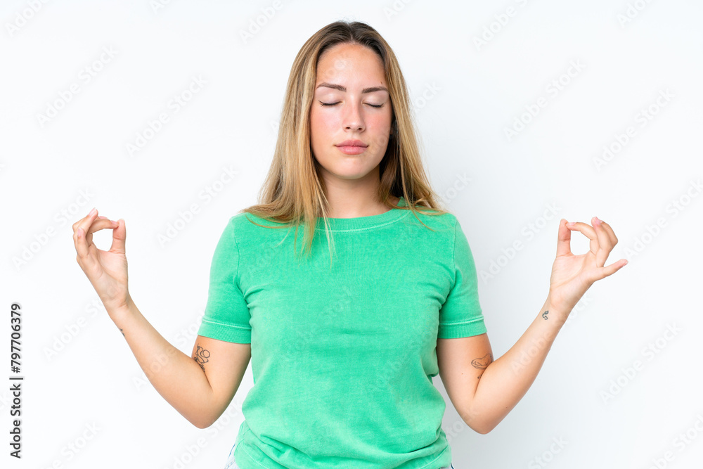 Young caucasian woman isolated on white background in zen pose Young caucasian woman isolated on white background in zen pose
