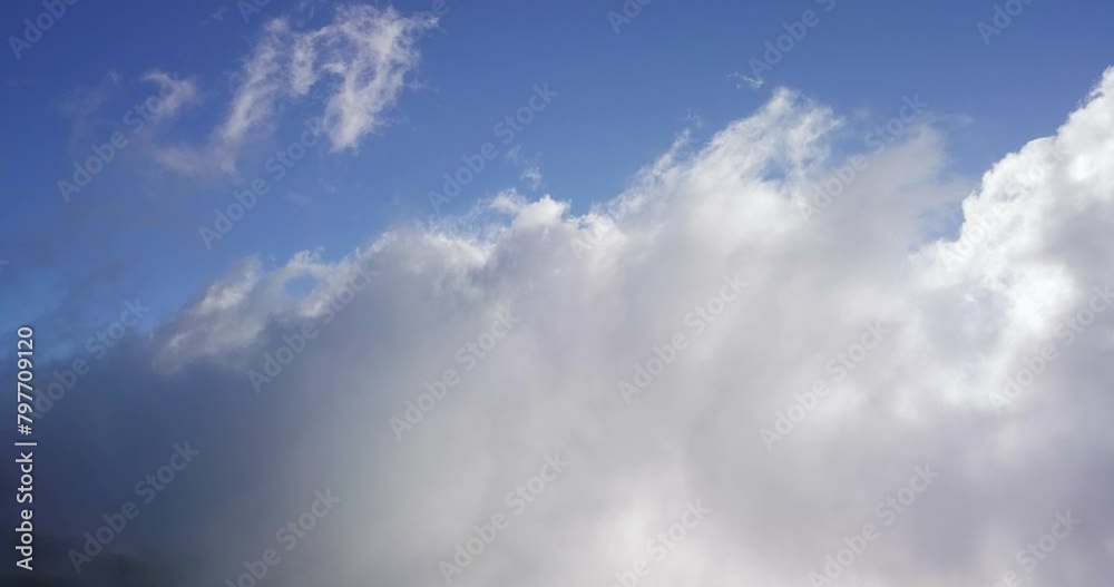 Pure serene grey and white stratus cloudscape texture under blue sky Pure serene grey and white stratus cloudscape texture under blue sky