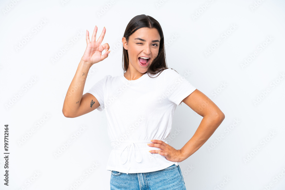 Young caucasian woman isolated on white background showing ok sign with fingers