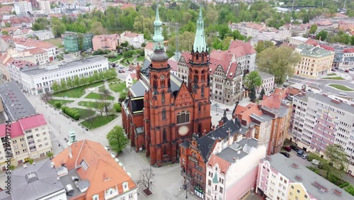Exterior View Of Cathedral of Saint Apostles Peter and Paul in Legnica, Poland. - aerial shot photo