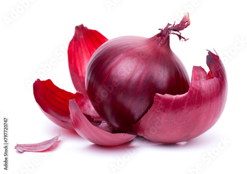 A vibrant red onion with its layers partially peeled, showcasing freshness and quality, isolated on a white background © Jacek Fulawka