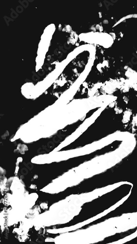 Vertical video of splashed ink and hand drawn elements on motion loop background with noise scratches and dusty texture effects. Hand drawn grunge textures in fast motion loop background
