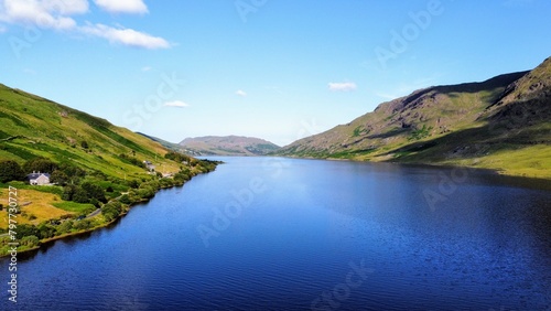 Beautiful view of the serene blue waters surrounded by majestic mountains. Ireland © Wirestock