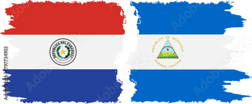 Nicaragua and Paraguay grunge flags connection vector