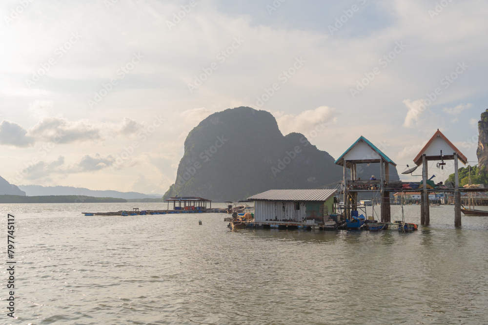 Koh Panyee, The Floating village urban city town houses, lake sea or river. Nature landscape fisheries and fishing tools at Pak Pha, Phang Nga, Thailand. Aquaculture farming Koh Panyee, The Floating village urban city town houses, lake sea or river. Nature landscape fisheries and fishing tools at Pak Pha, Phang Nga, Thailand. Aquaculture farming
