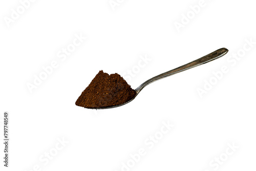 coffee powder in a spoon isolated on white background