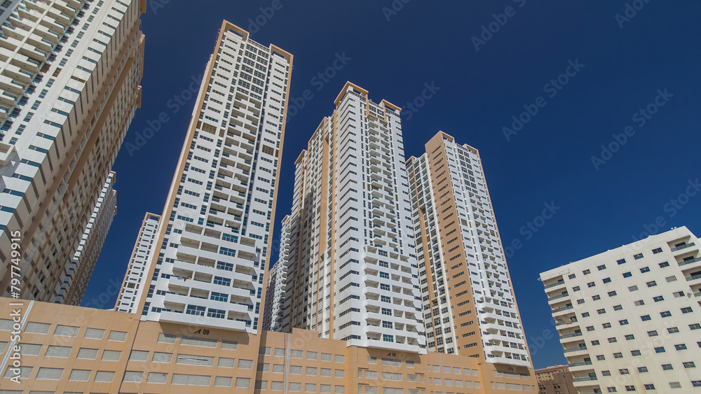 Modern new towers in Ajman timelapse hyperlapse. Cityscape of Ajman. Modern new towers in Ajman timelapse hyperlapse. Cityscape of Ajman.