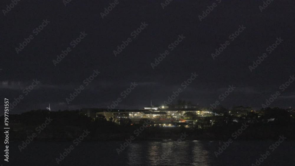 Illuminated resort from ocean. View in middle of the night. Illuminated resort from ocean. View in middle of the night.