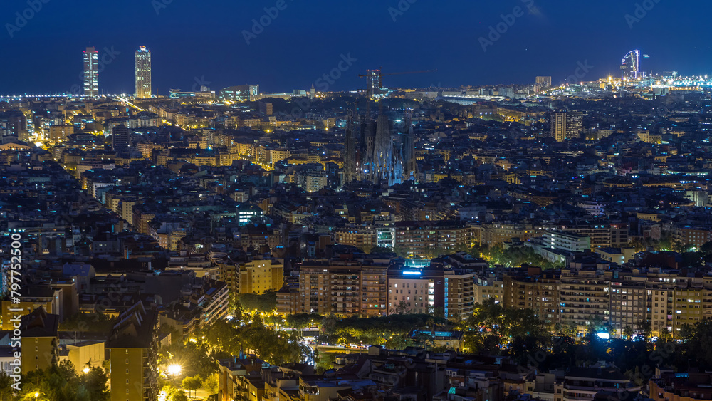 Obraz premium Panorama of Barcelona night to day timelapse, Spain, viewed from the Bunkers of Carmel