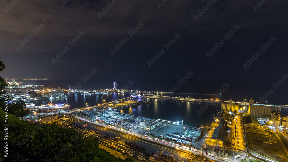 Obraz premium Night skyline from Montjuic with Port Vell timelapse, Barcelona, Catalonia, Spain