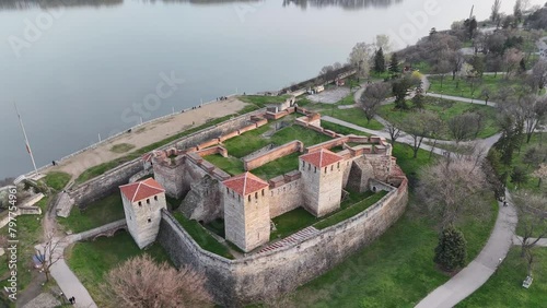 Aerial footage of the Baba Vida Fortress overlooking the Danube River at sunset in Vidin, Bulgaria photo