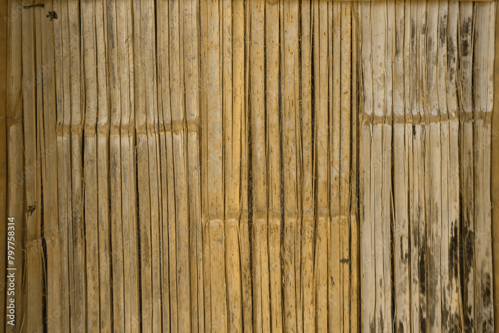 Natural wood slats wall or lath line arrange. Flooring pattern surface texture. Close-up of interior architecture material for design decoration background. Natural wood slats wall or lath line arrange. Flooring pattern surface texture. Close-up of interior architecture material for design decoration background.