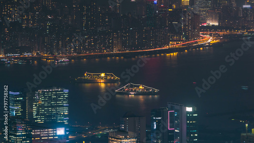 Hong Kong cityscape skyline from Fei ngo shan Kowloon Peak night timelapse. photo