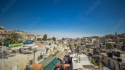 Skyline of the Old City in Jerusalem with historic buildings aerial timelapse, Israel. photo