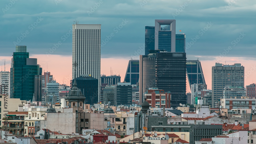 Madrid Skyline at sunset timelapse with some emblematic buildings such as Kio Towers