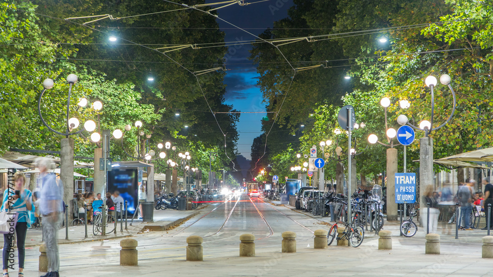Obraz premium Corso Sempione night timelapse, one of the main radial boulevards of Milan