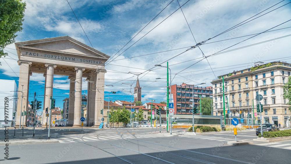 Obraz premium Street view on Ticinese city gate and tram timelapse in Milan.