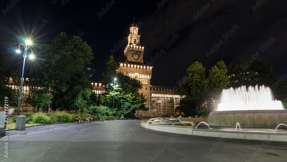Main entrance to the Sforza Castle and tower - Castello Sforzesco night timelapse hyperlapse, Milan, Italy