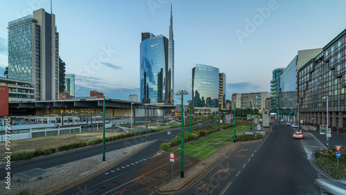 Milan skyline with modern skyscrapers in Porta Nuova business district day to night timelapse in Milan, Italy, after sunset. photo