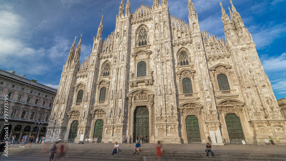 The Duomo cathedral timelapse hyperlapse at sunset. Front view with people sitting on stairs