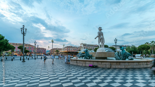 The Fountain du Soleil on Place Massena square Nice day to night timelapse, French Riviera, Cote d'Azur, France